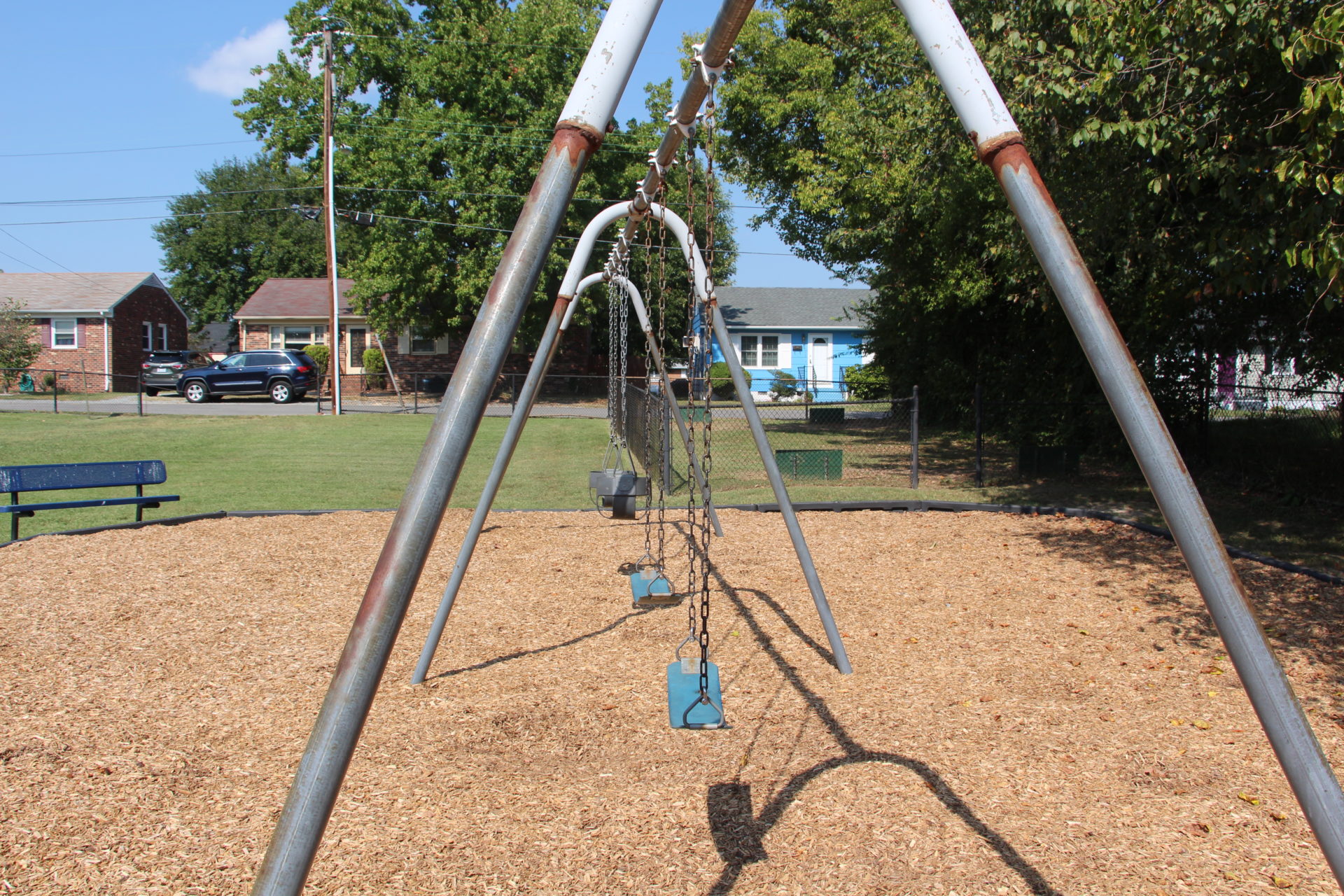 A set of playground swings.